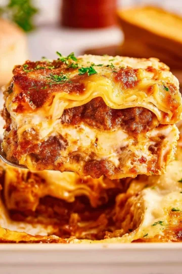 Delicious homemade lasagna layered with ricotta cheese and fresh ingredients.