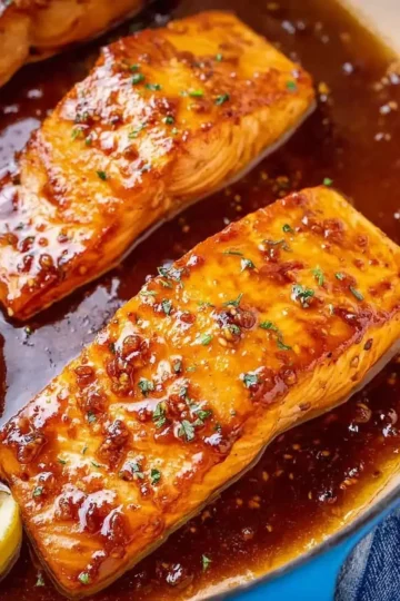 Delicious honey garlic salmon fillet garnished with green onions