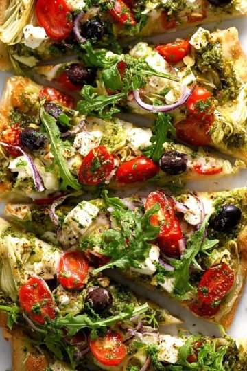 Mediterranean Flatbread Pizza topped with fresh ingredients and herbs