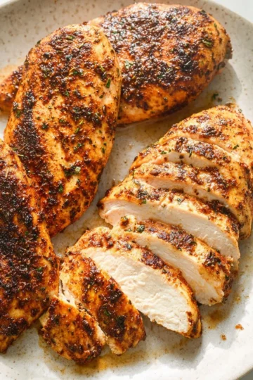 Delicious baked chicken breast served with a side of vegetables