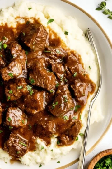 Tender beef tips served with savory sauce over rice