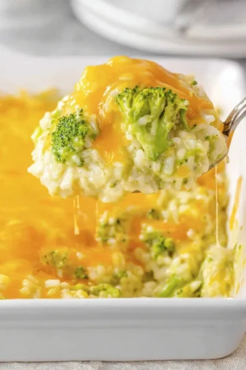 Savory Broccoli Rice Casserole with cheese and vegetables in a baking dish