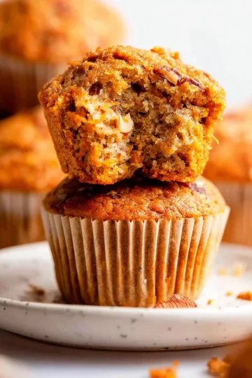 Freshly baked carrot muffins with a moist texture and spices