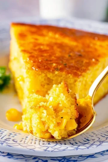 Delicious cornbread casserole served in a baking dish