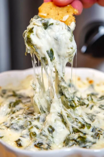 Creamy Crock Pot spinach artichoke dip served in a bowl