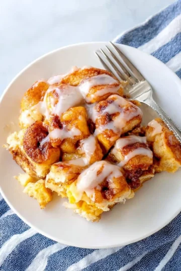 Easy cinnamon roll French toast casserole baked and served in a dish