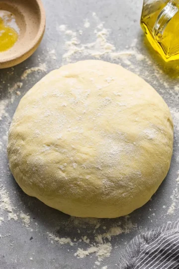 Easy homemade pizza dough ready to be crafted into delicious pizzas