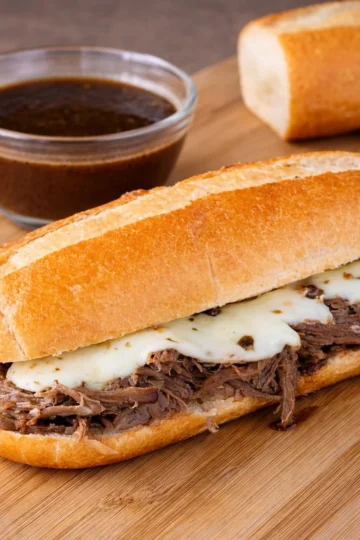 Delicious French Dip sandwiches served with a side of savory dipping sauce.