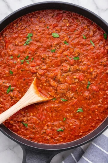 Delicious homemade spaghetti sauce simmering in a pot