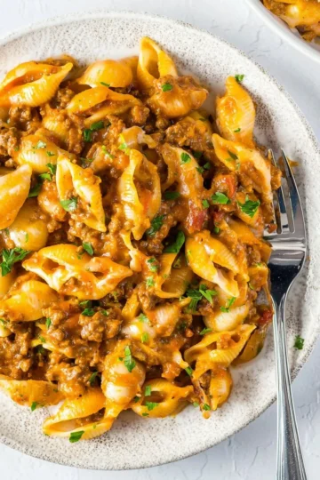 One Pot Taco Pasta served in a bowl with toppings