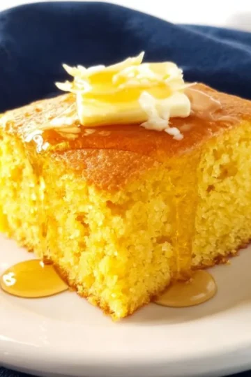 Delicious slice of best ever moist cornbread served on a plate