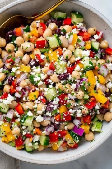 Delicious dense bean salad featuring a mix of colorful beans and fresh ingredients.