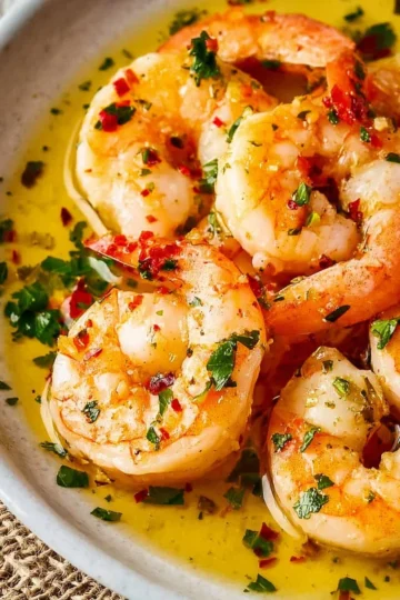 Delicious shrimp scampi served with pasta and garlic butter sauce