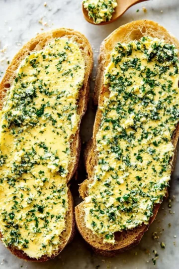 Delicious homemade garlic bread with golden crust and fresh herbs