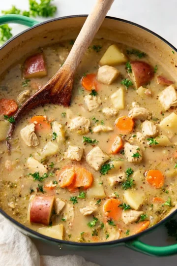 Bowl of delicious homemade chicken stew with vegetables and herbs