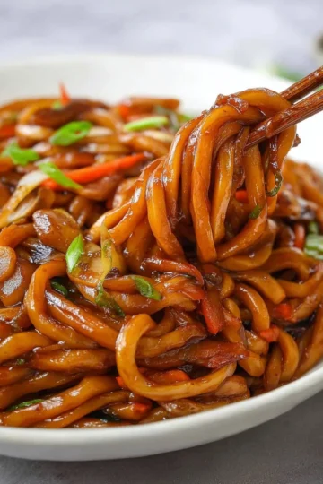 Delicious Yaki Udon noodles stir-fried with vegetables and shrimp.