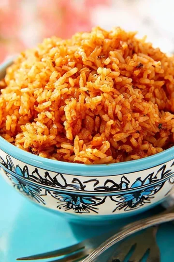 Plate of delicious homemade Mexican Rice garnished with cilantro.