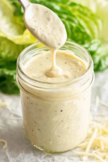 Delicious homemade Caesar Salad Dressing prepared with fresh ingredients.